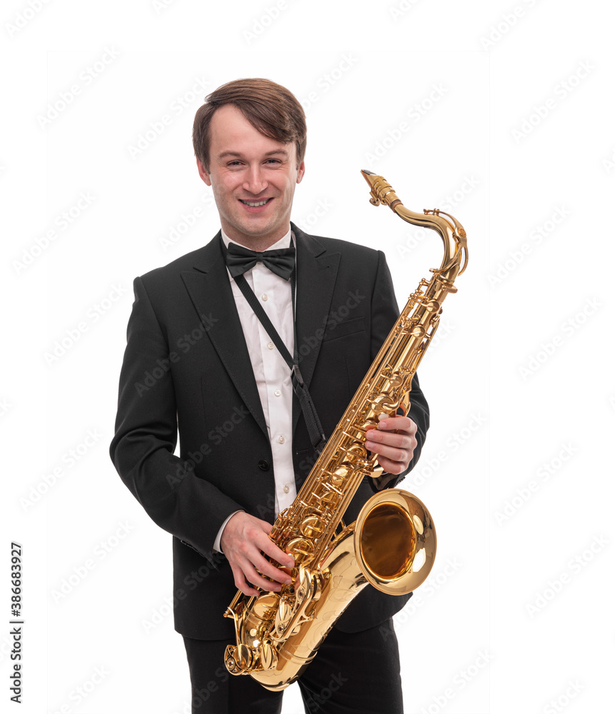 Fototapeta premium Saxophonist with a saxophone in his hands on a white background.