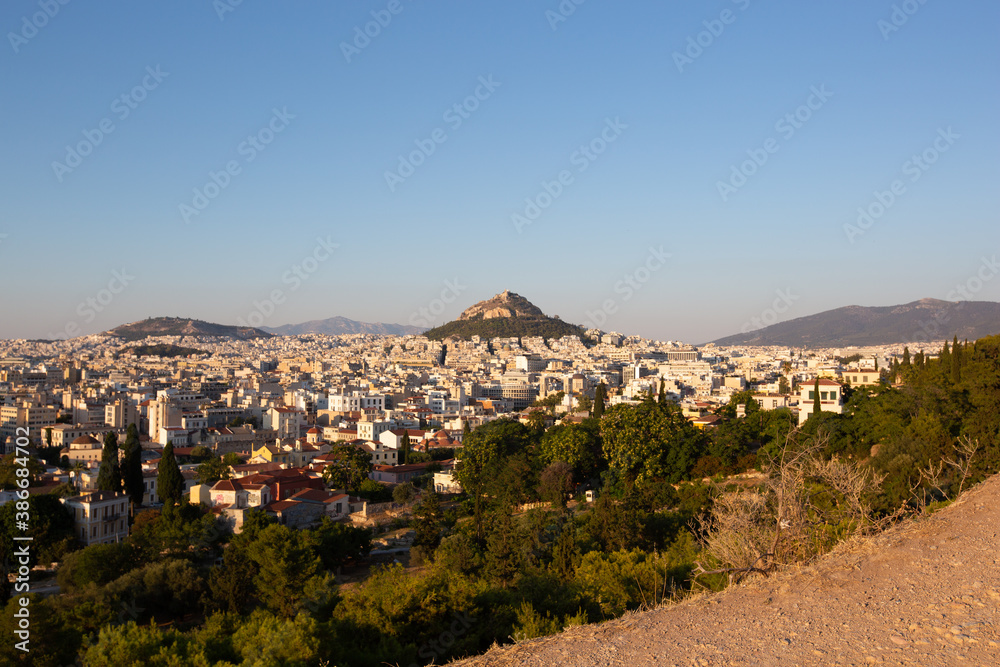 Wide view of Athens Cityscape and Mount Lycabettus at Sunset Scenic view