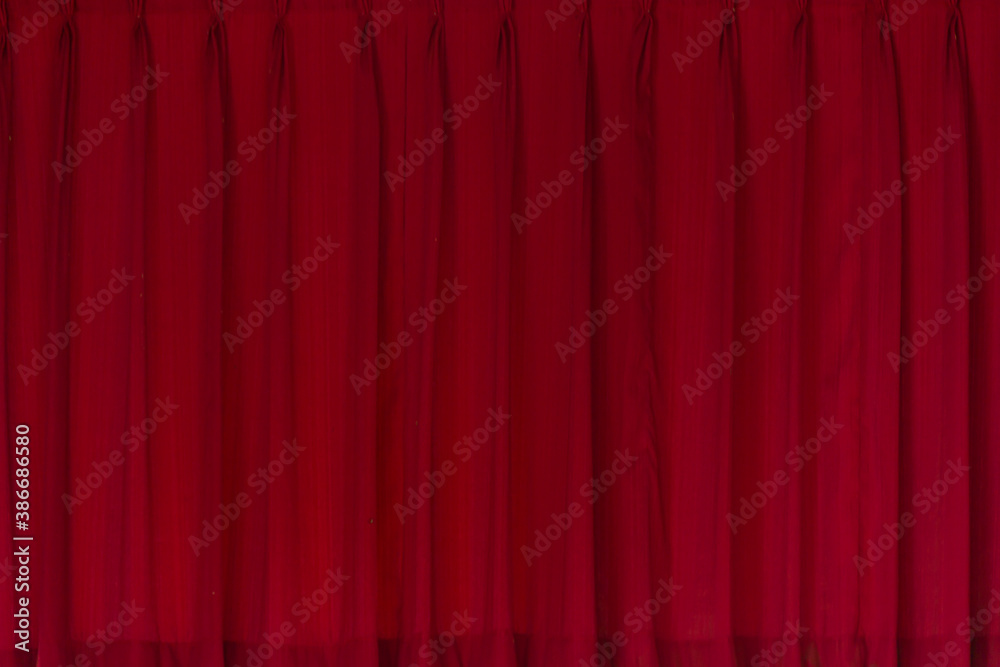 red movie or theatre curtain with some smooth lines in it red movie or theatre curtain with some smooth lines in it