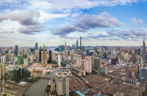 Aerial view of the skyscrapers in Shanghai, China, on a cloudy day. © Zimu