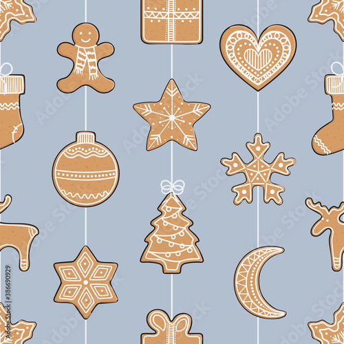Seamless pattern with gingerbread cookies on a string