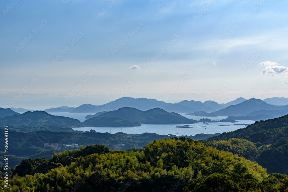 Fototapeta premium A view of the Seto Inland Sea as seen from mountain in Fukuyama city