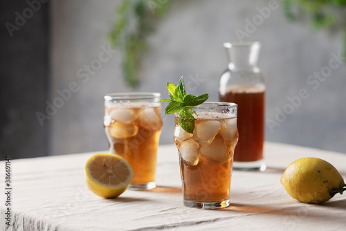 Cold summer tea with lemon and mint
