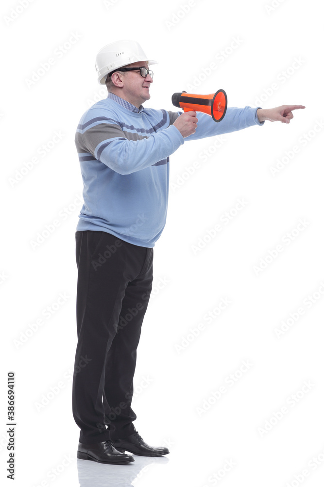 side view. a Mature man with a megaphone explains something. side view. a Mature man with a megaphone explains something.