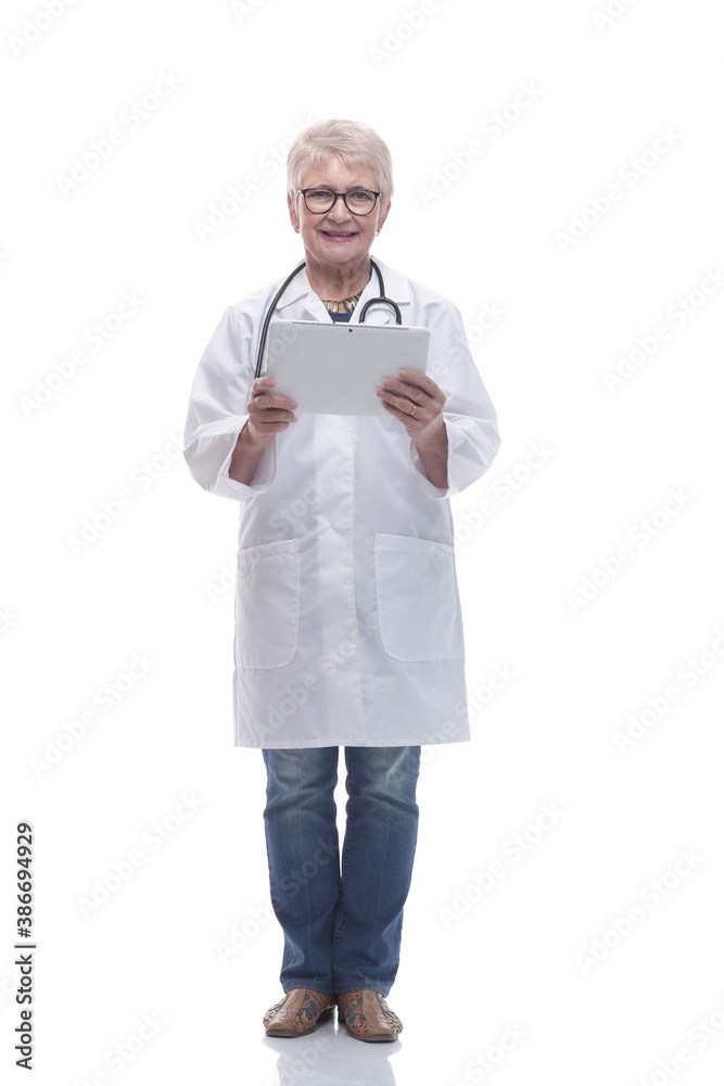 in full growth. Mature woman doctor with digital tablet in full growth. Mature woman doctor with digital tablet