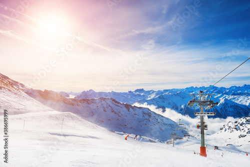 Ski resort in winter Alps. Val Thorens, 3 Valleys, France. Beautiful mountains and the blue sky, winter landscape