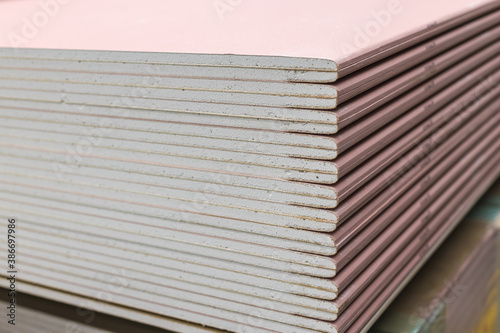 Drywall in the store. Pink coated drywall is sold in a supermarket in a warehouse. Construction industry.