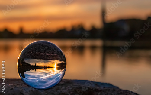 Crystal ball alpine sunset shot at the famous Schliersee, Bavaria, Germany