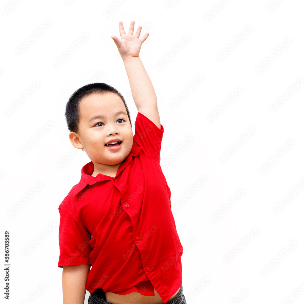 Little kindergarten boy raised his hand On a white background Little kindergarten boy raised his hand On a white background