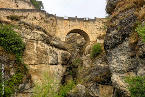 Photography Bridge of Saint Michael on Guadalevin River in Ronda, Andalusia, Spain