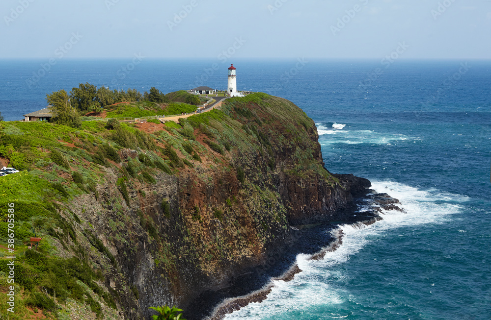 The Kilauea lighthouse and bird observatory in Kauai by the Pacific Ocean