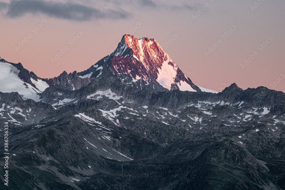 sunrise over the swiss Alps, Switzerland. sillhouettes of mountains