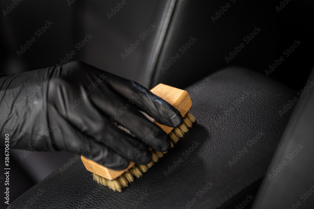 car datailing interior - dark background, work passionate about precision
