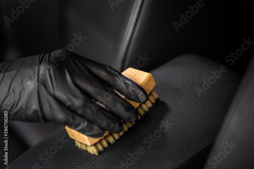 Obraz na płótnie car datailing interior - dark background, work passionate about precision w salonie