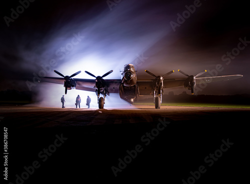 Fotografiet Avro Lancaster 'Just Jayne' with some very professional re enactors