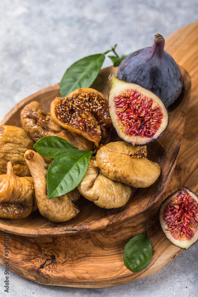 Organic dried figs close up, vegetarian food background