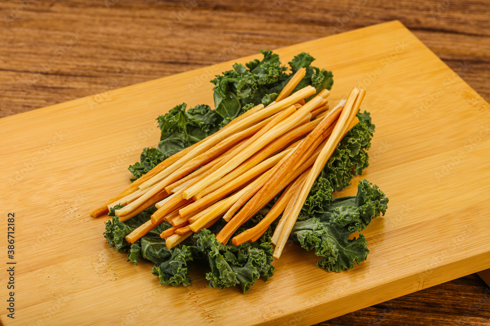 Chechel cheese sticks over board Chechel cheese sticks over board