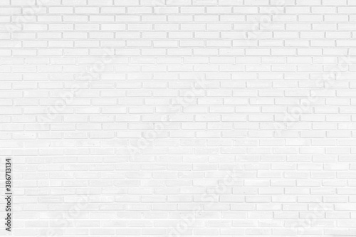 White brick wall texture background. Abstract weathered brickwork design backdrop.