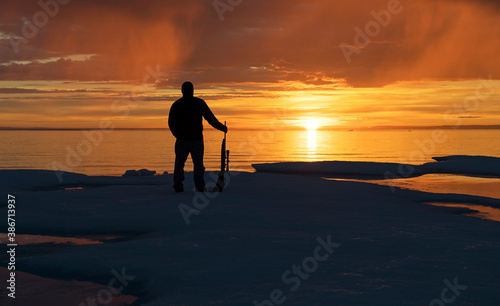 guard watching the midnight sun