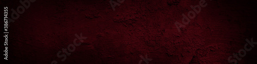 Dark background grunge texture design with distressed dark red rust pattern, paint splashes, broken cracks and blemishes