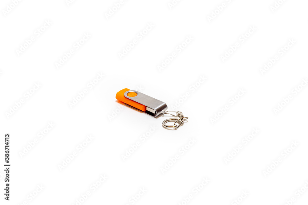 orange USB flash drive on white background orange USB flash drive on white background