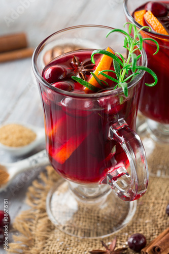 Christmas Hot mulled wine in glasses with orange slices.