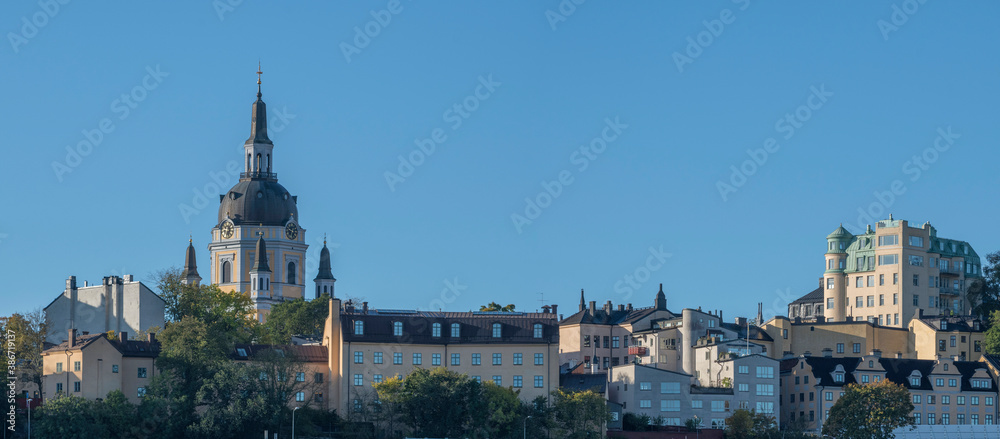 Skyline over the district Maria and the church Maria kyrkan and old houses in Stockholm an autumn day