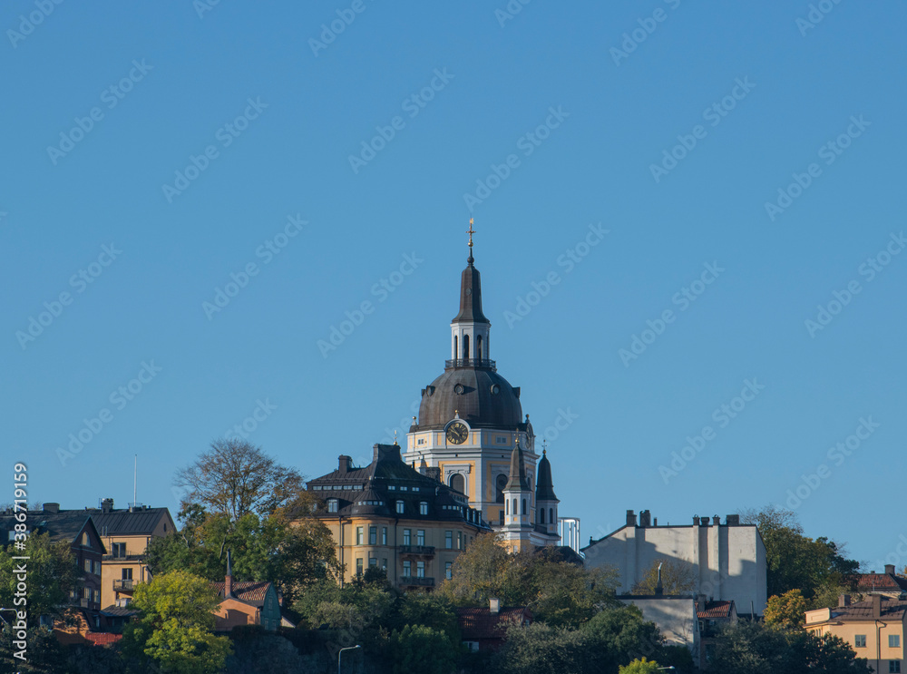 Skyline over the district Maria and the church Maria kyrkan and old houses in Stockholm an autumn day