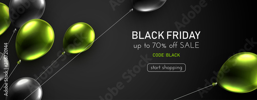 Black friday dark background with black and green balloons.