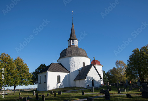 Munsö church from 1100s in the district Ekerö, Stockholm photo