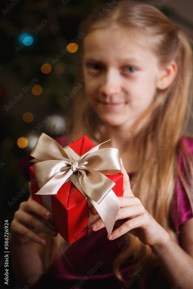 girl holding presents in hands girl holding presents in hands