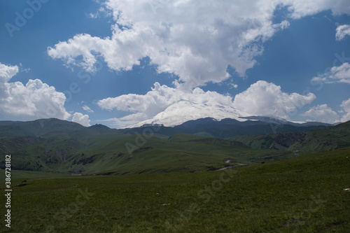 Mountain view. Mountains of the North Caucasus in summer. View of mount Elbrus. Eternal glacier.