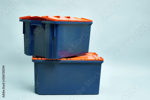 Plastic storage boxes. Boxes for the delivery of products. Orderly storage.