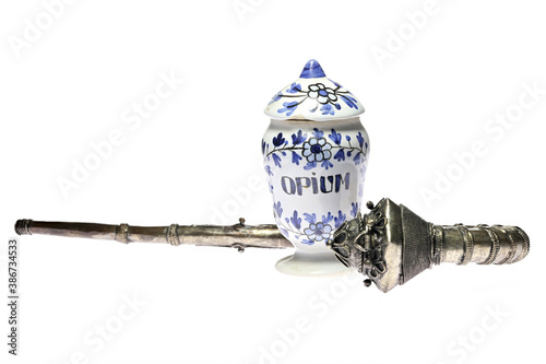 vintage apothecary jar and opium pipe isolated on white background