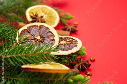 Fir tree branches, dried orange slices and spices