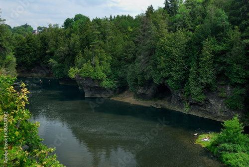 Picnic and boys fishing in the Grand River at Elora Gorge Ontario