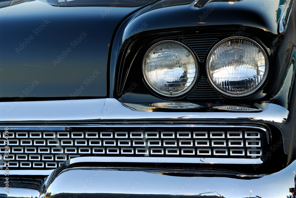 Headlights and grill of a black 1959 Meteor Montcalm made in Canada