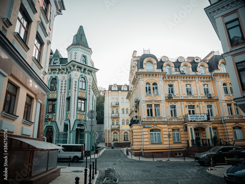 Kyiv, Ukraine - October 10 2020: Old historic colorful street buildings of Kyiv city in Podil vozdvizhenka neighborhood multicolored houses photo