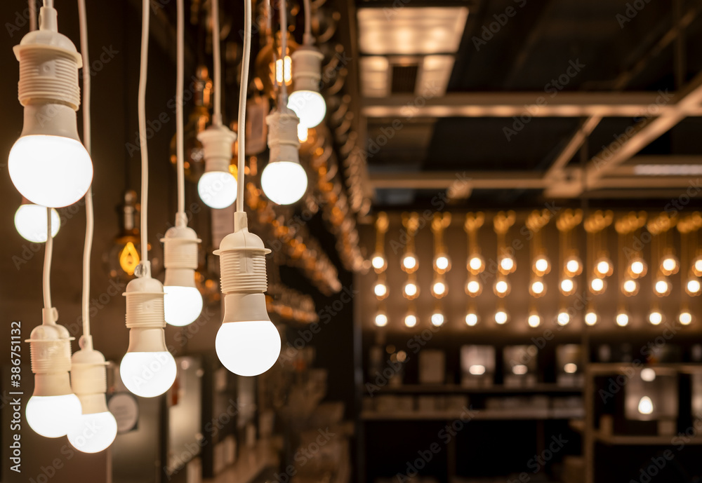 decorative light bulbs hanging from the ceiling. light sources for the background.