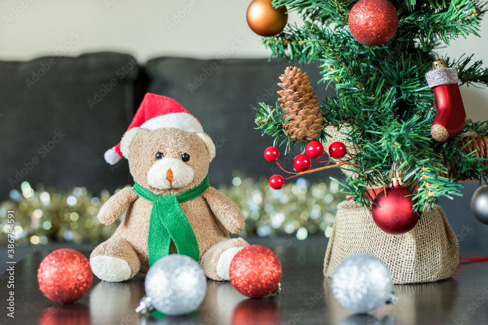 Christmas teddy bear and New Year decorations on the table Christmas teddy bear and New Year decorations on the table