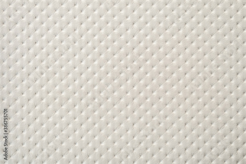 Fotografie White perforated furniture upholstery leather texture