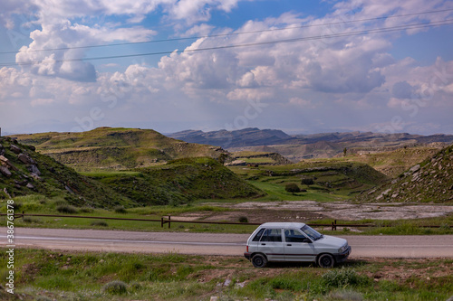 Fototapeta Naklejka Na Ścianę i Meble -  car and mountain - Dezful (shahyon county ) Iran.  