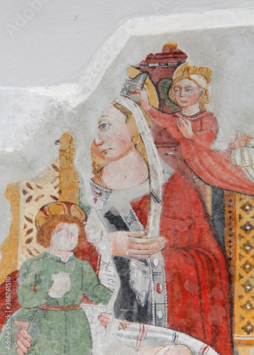 Maria incoronata da un Angelo; affresco nella chiesa della Natività di Maria a Pellizzano (Trentino) photo