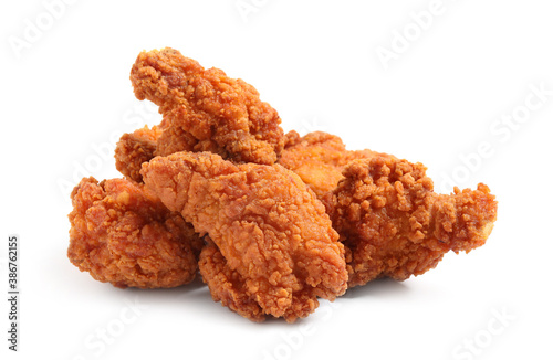 Tasty deep fried chicken pieces isolated on white