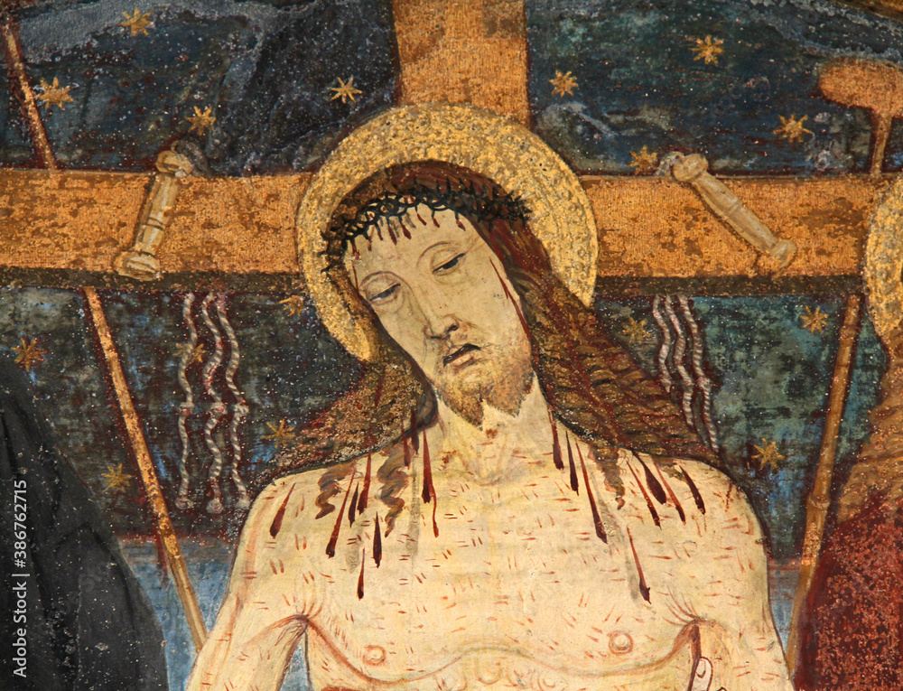 Cristo morto e strumenti della Passione; del portale della