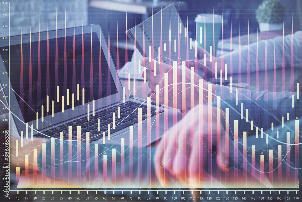 Double exposure of man and woman working together and forex chart hologram. Business concept. Computer background. Double exposure of man and woman working together and forex chart hologram. Business concept. Computer background.