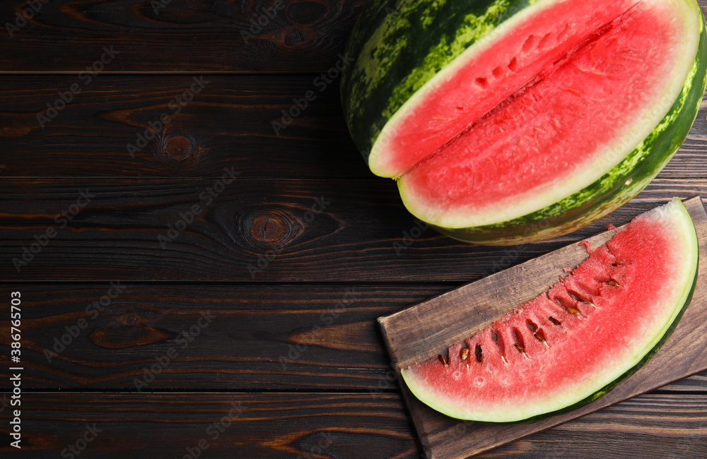 Yummy watermelon on wooden table, flat lay. Space for text - obrazy, fototapety, plakaty 