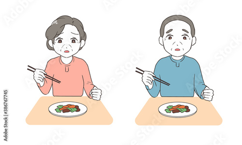 箸の持ち方を練習する　不安げ　高齢者