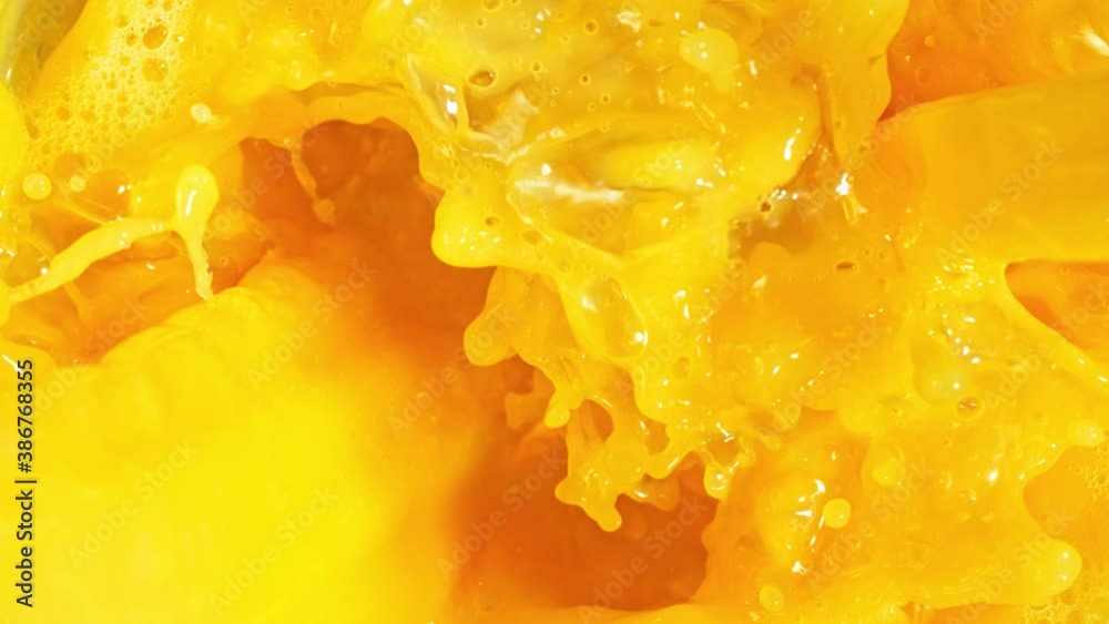 Super Slow Motion Shot of Pouring Fresh Orange Juice at 1000fps. Super Slow Motion Shot of Pouring Fresh Orange Juice at 1000fps.