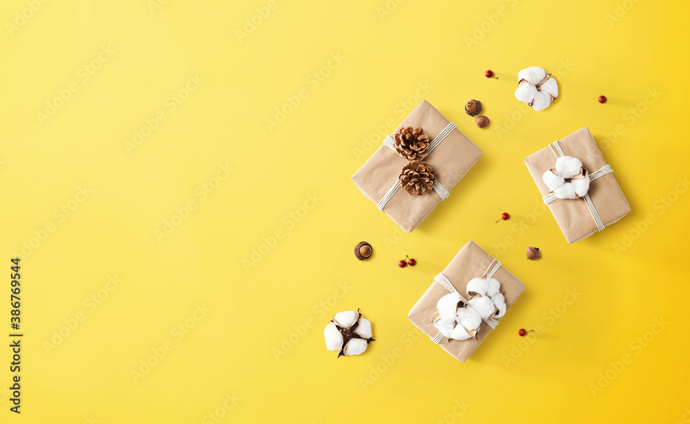 Gift boxes with autumn theme - overhead view flat lay Gift boxes with autumn theme - overhead view flat lay